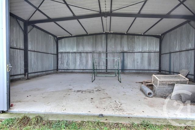 Afficher la photo en grand parking à vendre - 120.0 m2 - VILLERBON - 41 - CENTRE - Century 21 Girault Immobilier