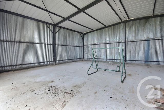 Afficher la photo en grand parking à vendre - 120.0 m2 - VILLERBON - 41 - CENTRE - Century 21 Girault Immobilier